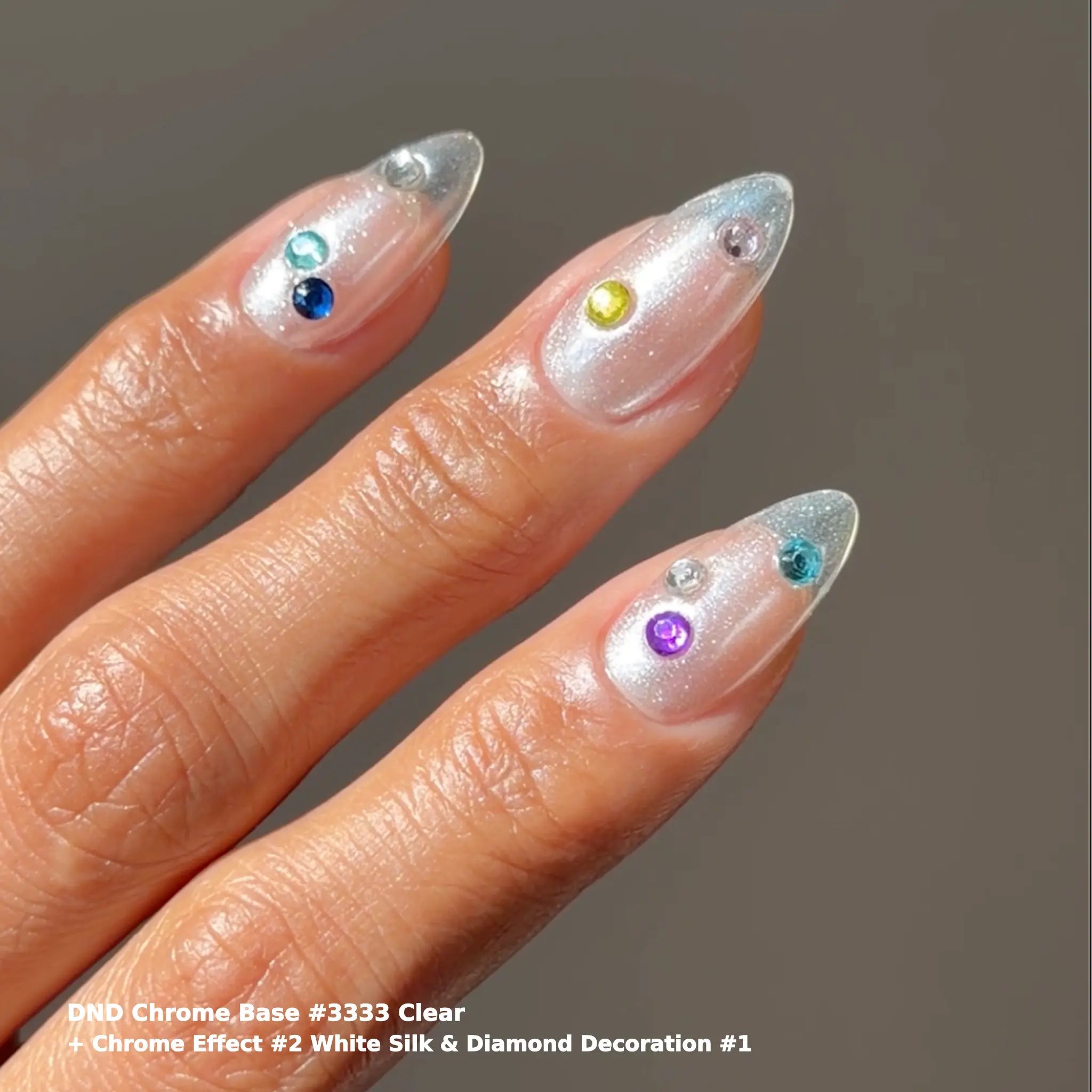 Nail art using DND Chrome Effect White Silk 02